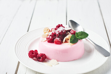 Raspberry panna cotta dessert.