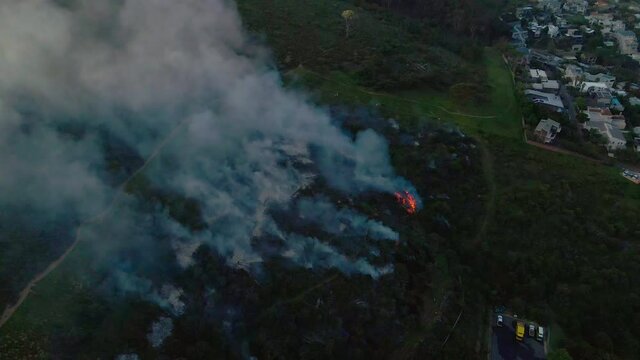 Aerial view of smoke and fire on Signal Hill in Cape Town, South Africa