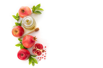 Pomegranates, apples and honey on white background, traditional food of Jewish New Year - Rosh...