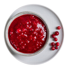 Cranberry sauce in gray bowl and fresh cranberry berries isolated on white background. Top view.