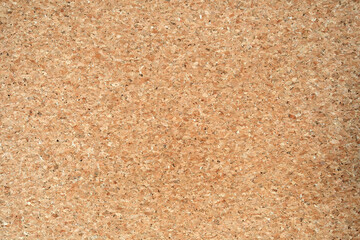 blank natural colored corkboard abstract background texture, simple beige