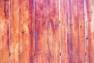 Flat texture of wooden timbers on the vertical wall.
