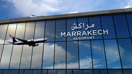Airplane landing at Marrakesh, Marrakech Morocco airport mirrored in terminal