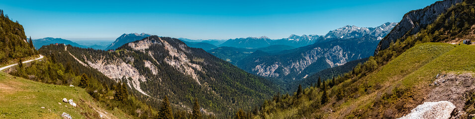 High resolution stitched panorama of a beautiful alpine summer view with the Kreuzeckbahn at the famous Alpspitze summit near Garmisch Partenkirchen, Bavaria, Germany