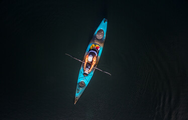 Man in kayak on lake