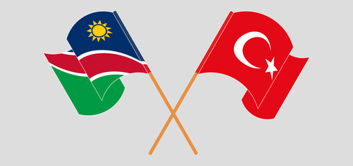 Crossed and waving flags of Namibia and Turkey