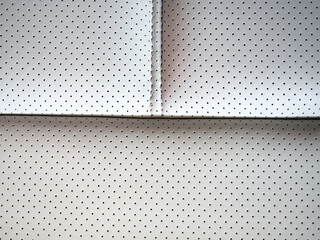 Close-up of white leather car seat of modern car