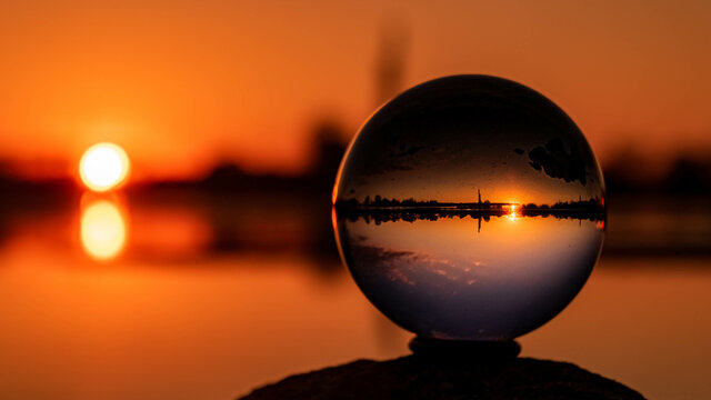 Crystal ball sunset shot at Pleinting, Danube, Bavaria, Germany