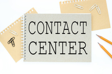 CONTACT CENTER . text on notepad on white background