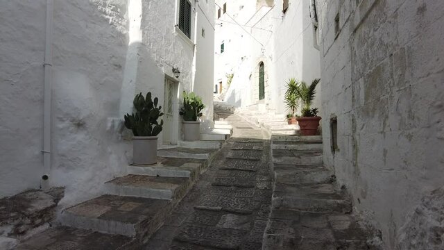 Scenic sight in Ostuni in a sunny summer afternoon. Apulia (Puglia), southern Italy.