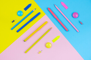 Felt-tip pens, pencils and other stationery on pastel backgrounds. Back to school concept. Minimalism. Perfectionism
