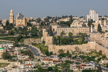 Fototapeta na wymiar Cityscape of Old City, Jerusalem with city walls and Dormition Abbey in the background, Israel.