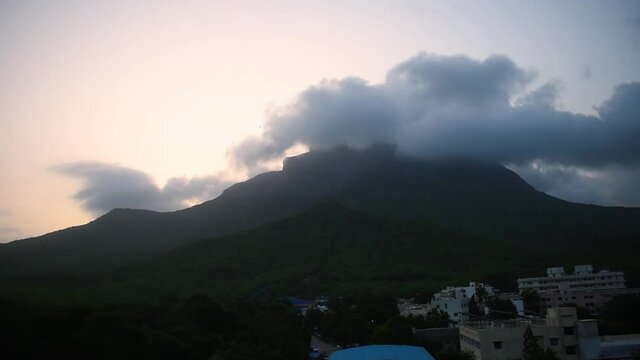 clouds over the mountains during time of sunset. at Girnar hills, Junagadh, Gujarat