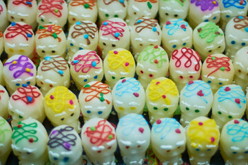 Set of sugar skulls in the market. Day of the Dead concept. Día de Muertos, Calaveritas de Azúcar.