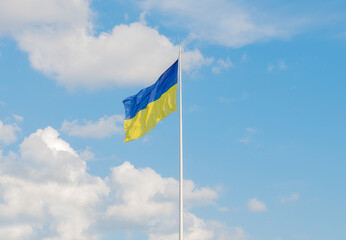 Ukraine flag on blue sky