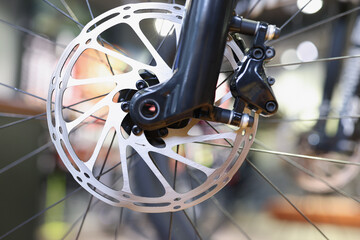 Fototapeta na wymiar Bicycle disk brake rotor in focus closeup