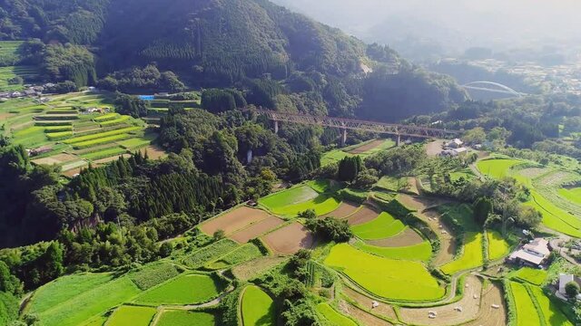 rice field landscape and arch bridge in Takachiho, Miyazaki, Japan (aerial photography)