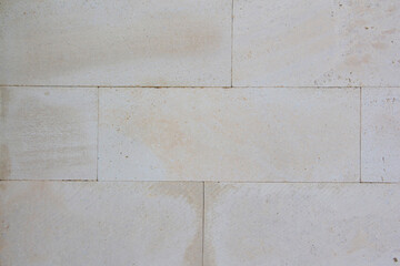 sandstone brick wall, background, close-up. Eco-friendly construction.