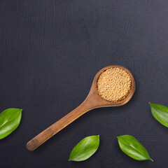 Amaranthus - Amaranth seeds in the wooden spoon. Healthy food