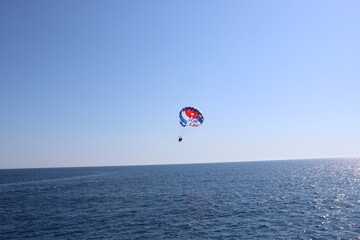 Parasailing in a blue sky, Alanya Turkey.