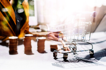 business people working at desk with piggy bank box.business finance saving and investment concept. hand put money coin into piggy bank for saving money wealth.