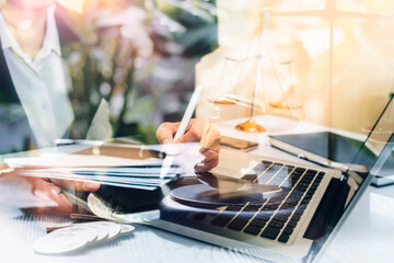 justice and law concept.Male judge in a courtroom on wooden table and Counselor or Male lawyer working in office. Legal law, advice and justice concept.