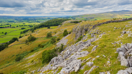 Climber at pot Scar above Feizor near to Settle in the Yorkshire Dales