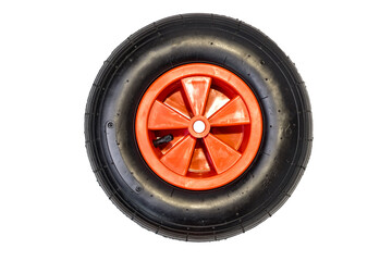 new nylon rubber inflatable black round wheel with red disc from garden wheelbarrow close up...