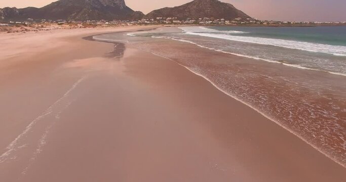 Aerial Man Running on Tropical Beach, Pringle Bay, South Africa