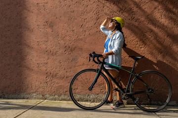 portrait of a mexican urban cyclist on sunny day