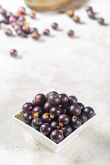 acai fruits and powder, the Amazon fruit with antioxidant powers - Euterpe oleracea