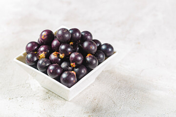 acai fruits and powder, the Amazon fruit with antioxidant powers - Euterpe oleracea