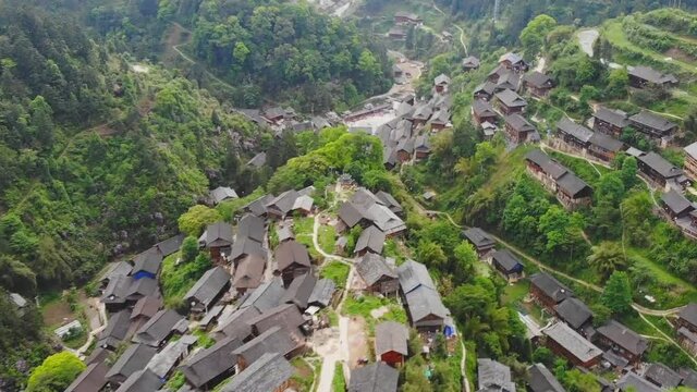 Aerial view of traditional wooden building cluster of Xijiang Qianhu Miao Village (The One Thousand Household Miao Village) , in southeastern Guizhou province of China.