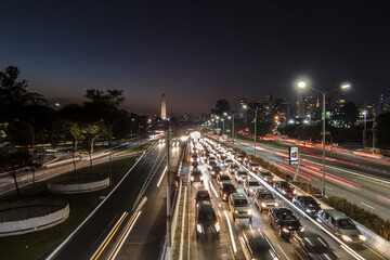 Fototapeta na wymiar Sao Paulo, Brazil, July 14, 2021. Traffic on 23 de Maio Avenue, near of Ibirapuera Park, in Sao Paulo