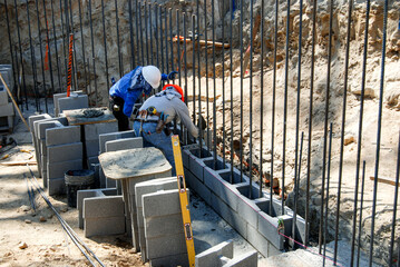 Starting a new structural block retaining wall build