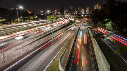 Sao Paulo, Brazil, July 14 2021.Night traffic on the famous 23 de Maio Avenue in Sao Paulo, Brazil. This avenue run past Ibirapuera Park.