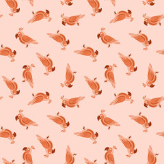 Decorative seamless pattern with orange random little parrots shapes print. Pastel pink background.