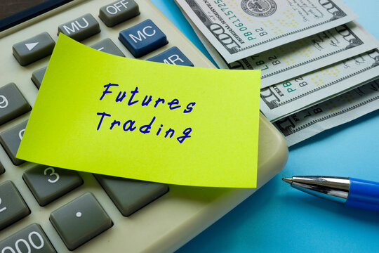 Business concept meaning Futures Trading with inscription on the piece of paper.