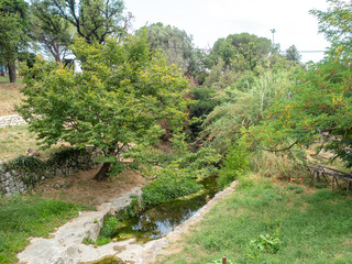Fototapeta na wymiar little stream in small provencal village in the French Riviera back country