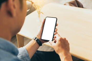 cell phone blank white screen mockup.hand holding texting using mobile on desk at office.background empty space for advertise.work people contact marketing business,technology