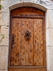 classic ancient door in small provencal village in the French Riviera back country