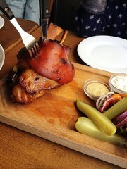meat and vegetables on a wooden table