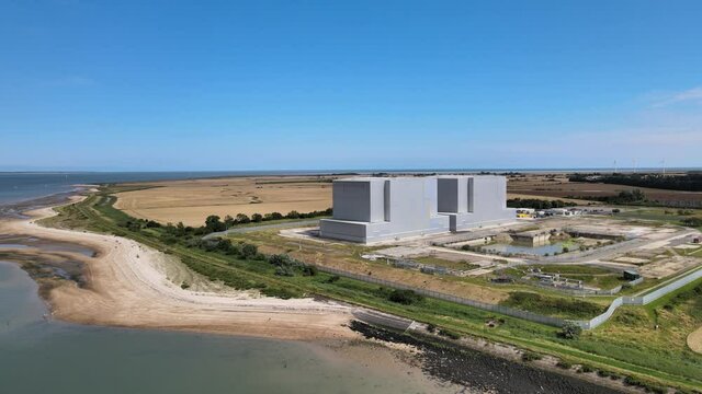 Bradwell decommissioned Nuclear Power station Essex UK Aerial footage sunny Summer day