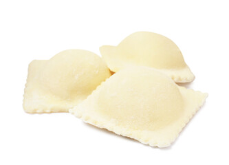 Uncooked ravioli with filling on white background