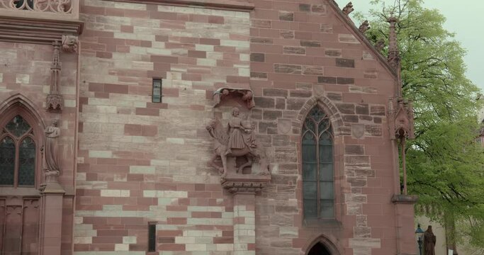 View from below of the Basler M&uuml;nster cathedral with a detail of the decorations