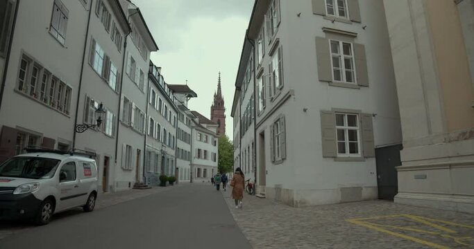 View of the Augustinergasse street with the Basler M&uuml;nster bell tower in the background