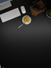 Portrait of hipster dark workspace, copy space on black background, Flat lay