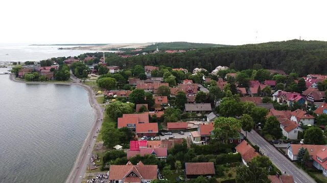 Center of small town Nida with red rooftops, resort of Lithuania, Neringa region