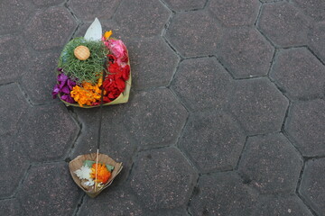 Balinese Hindu religious offerings called Canang are made with various kinds of flowers as offerings to God