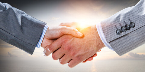 Partnership concept. Image of handshake